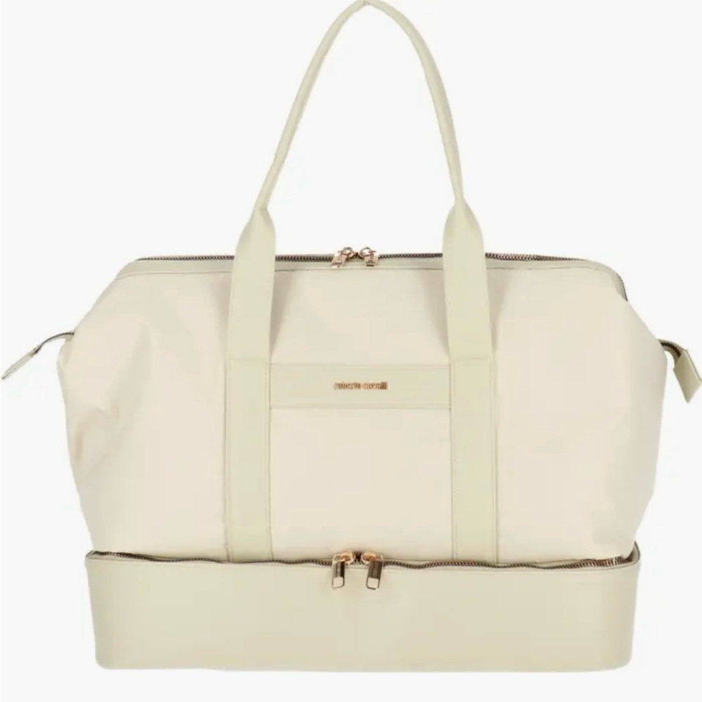 Roberto Cavalli Cream Colored 
Drop-Bottom Travel Bag! Very Stylish and Classy.